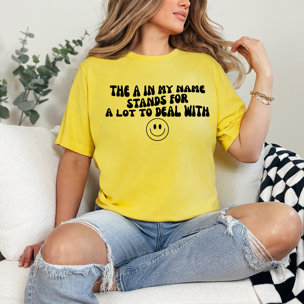 Wholesale A lot to deal with Graphic Tee - Heather Yellow Gold Tee